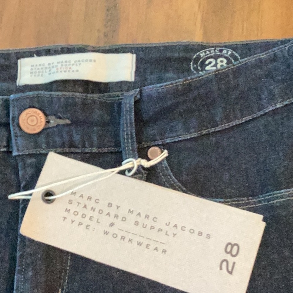 Marc Jacobs new with tags dark blue denim. Size 28x31 almost look black.